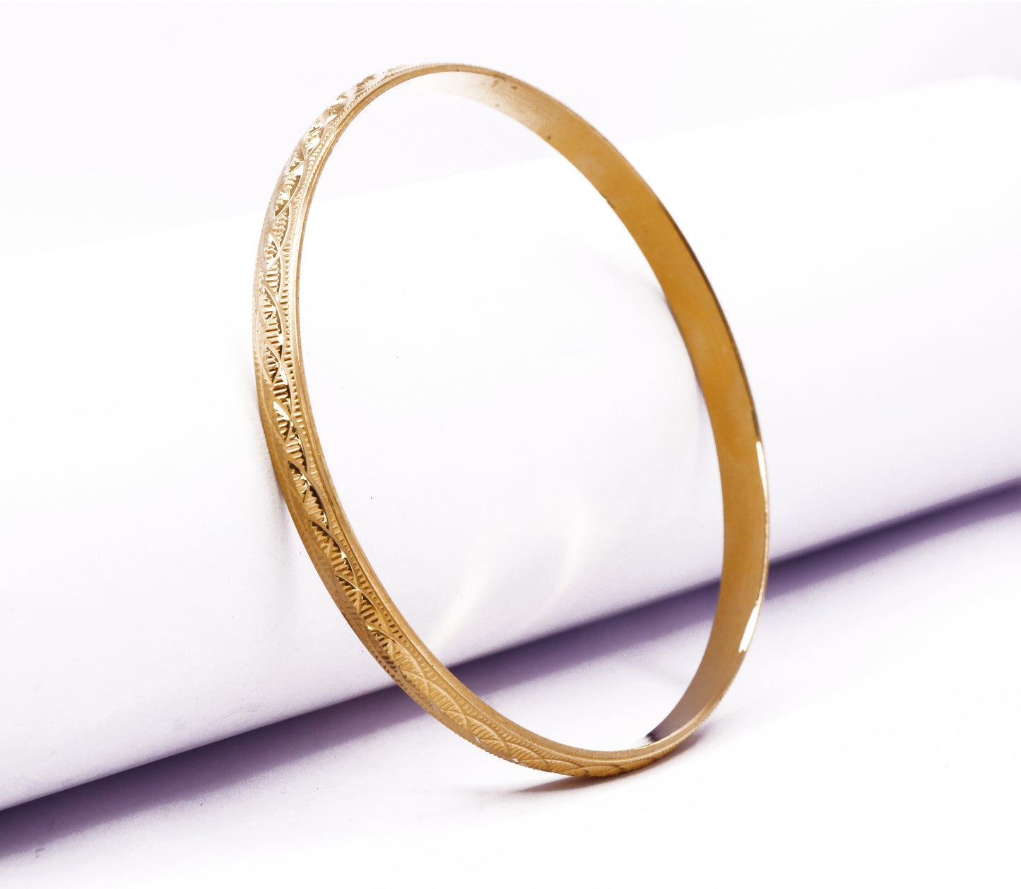 Gold Color diamond-cut scrollwork design Kada