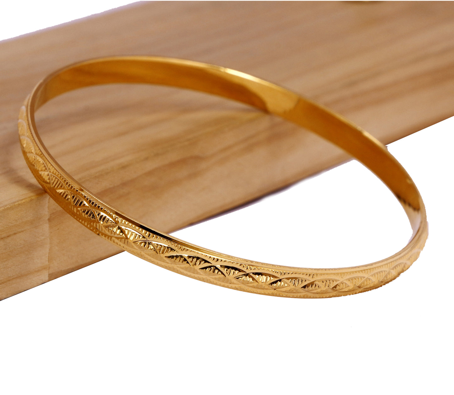 Gold Color diamond-cut scrollwork design Kada