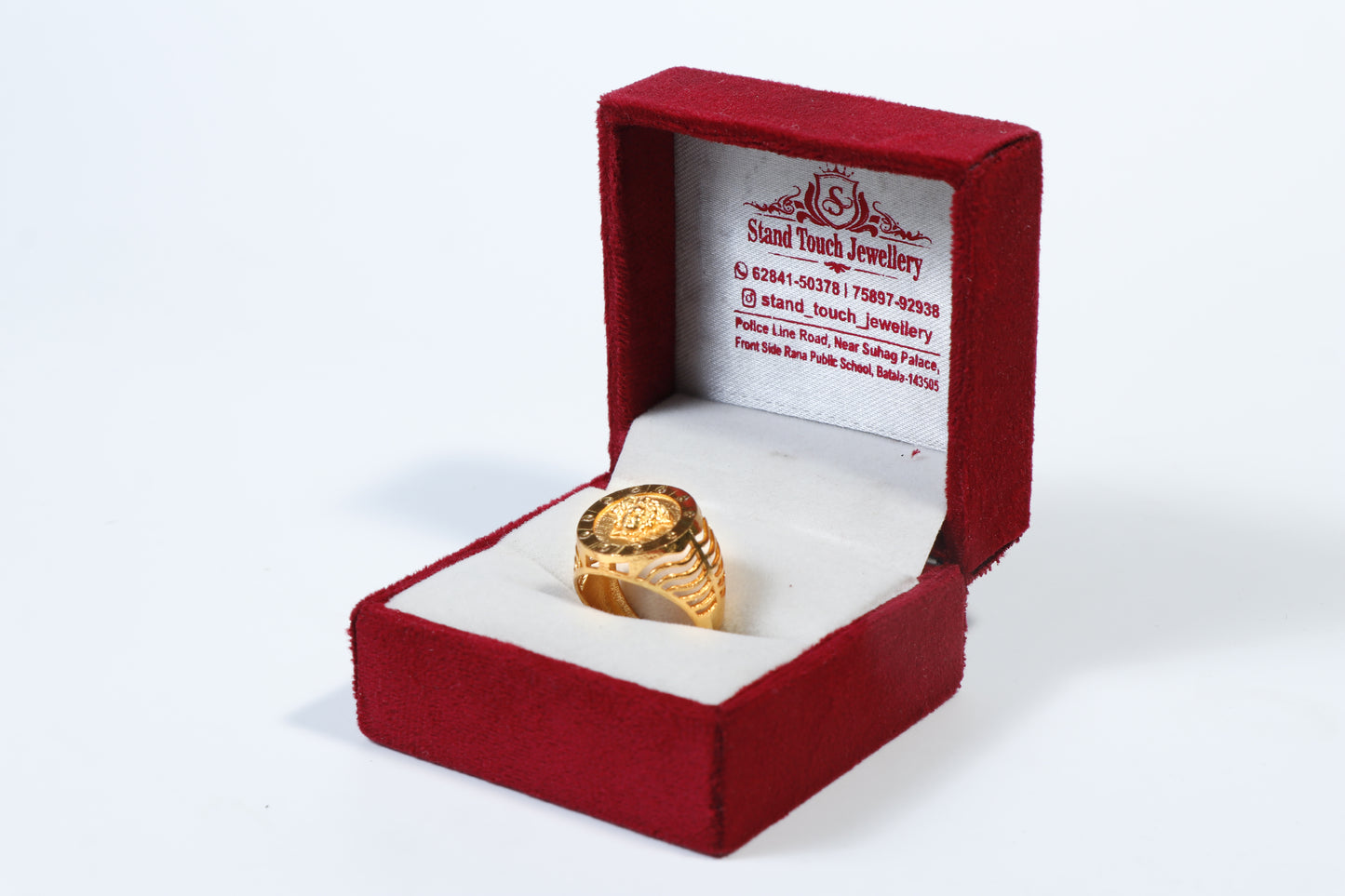 Gold-Plated Ring with Face Emblem