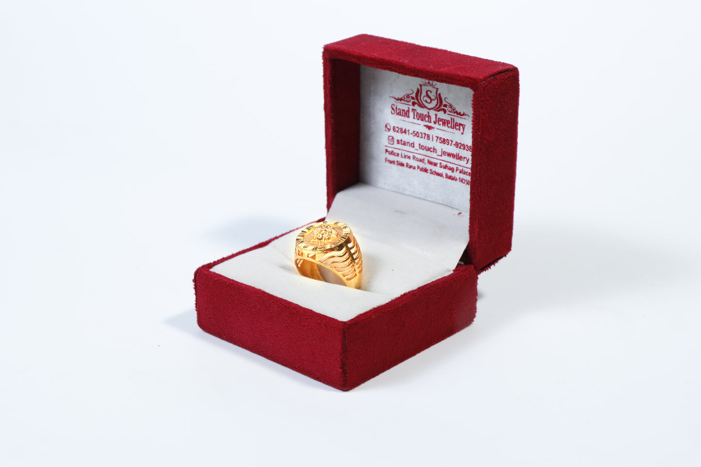 Gold-Plated Ring with Face Emblem