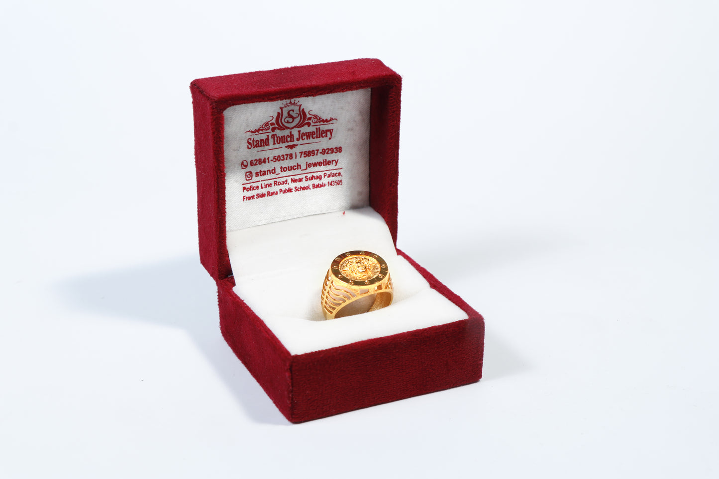 Gold-Plated Ring with Face Emblem