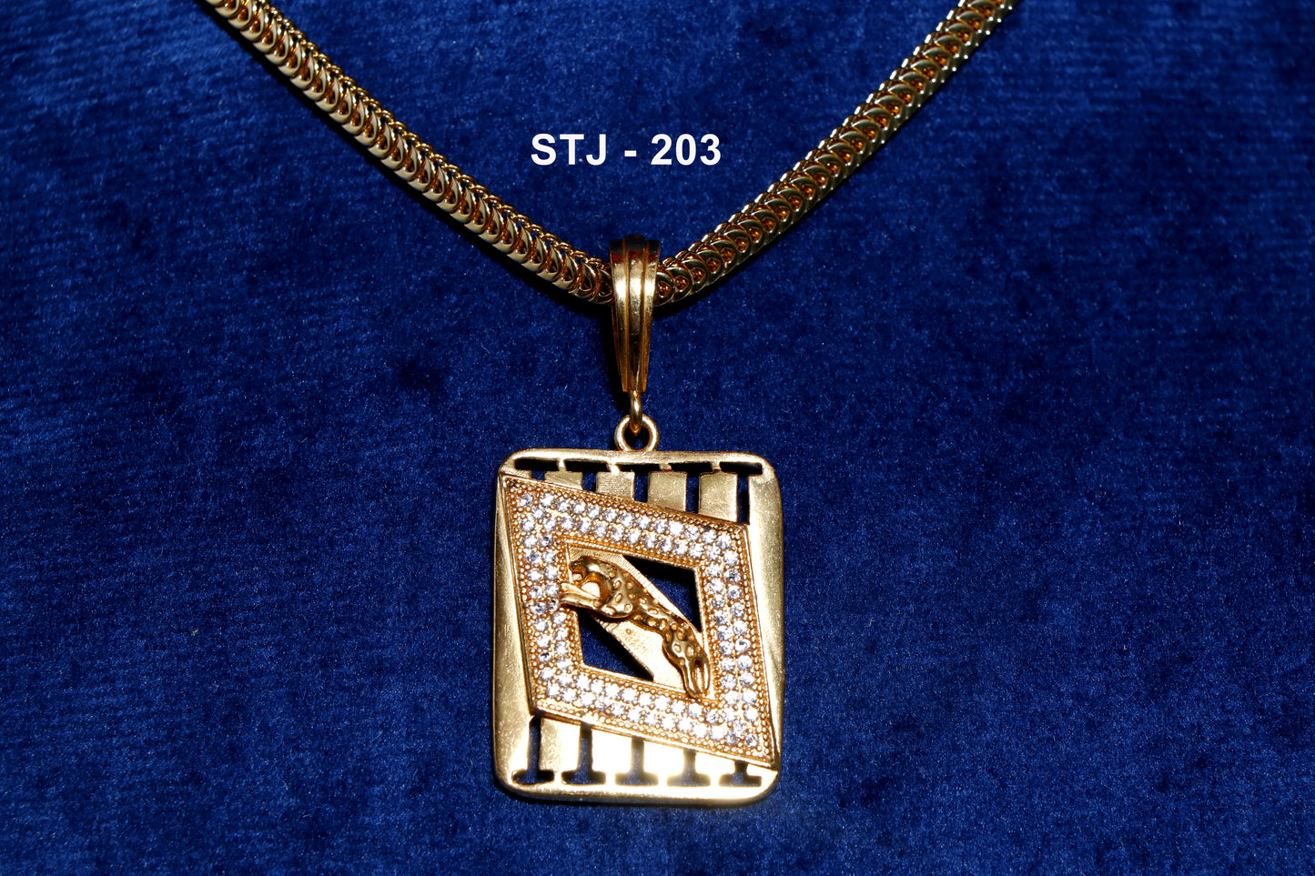 Men's locket from Standtouch featuring a gold pendant with geometric design and a panther motif.