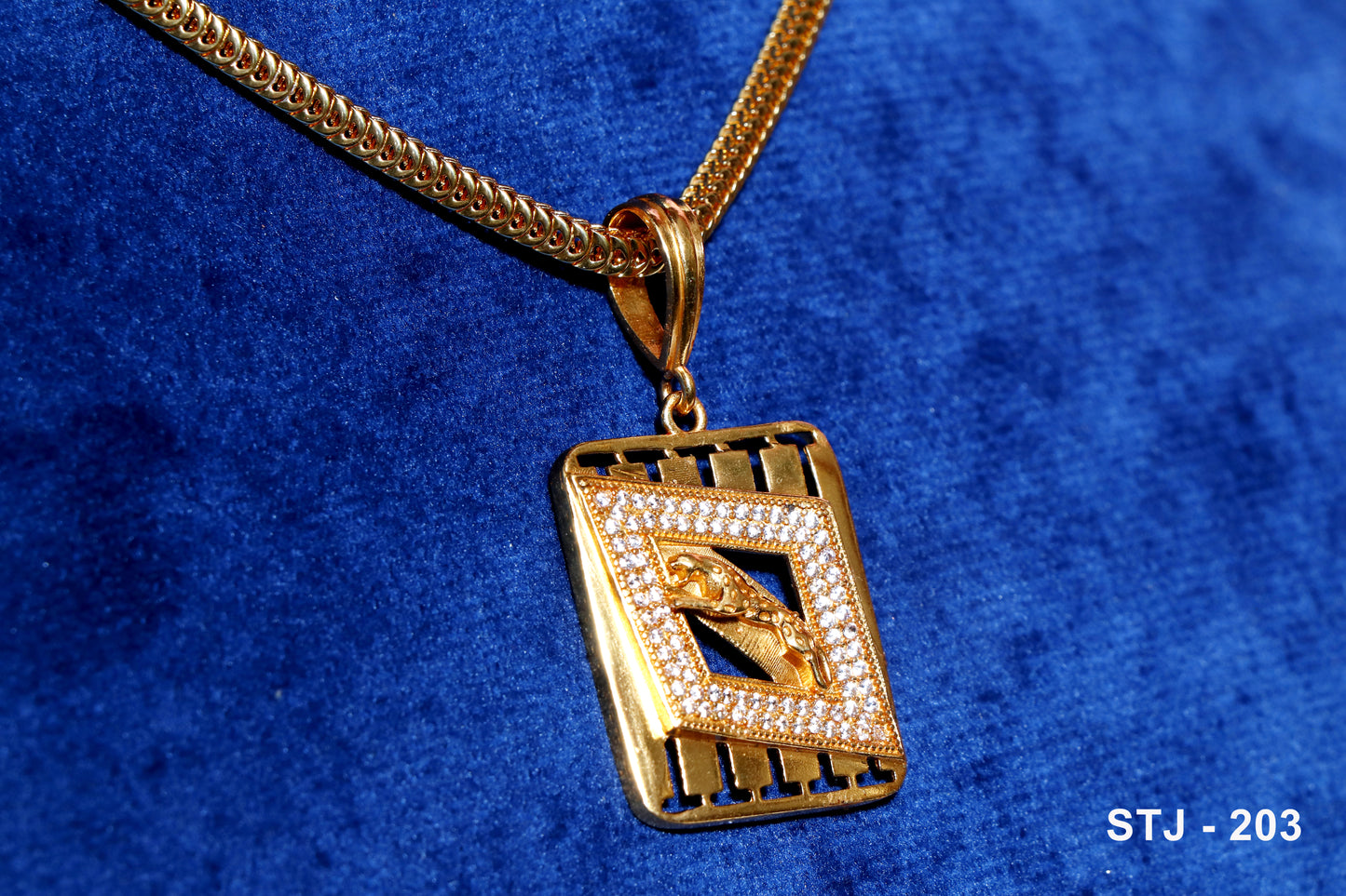 Men's locket from Standtouch featuring a gold pendant with geometric design and a panther motif.