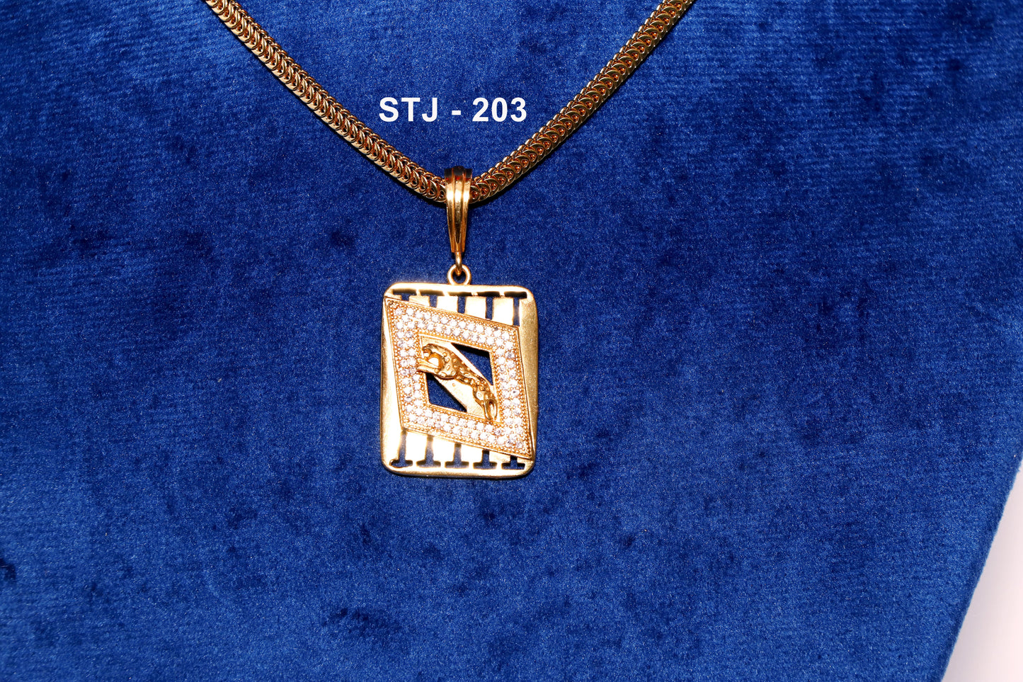 Men's locket from Standtouch featuring a gold pendant with geometric design and a panther motif.