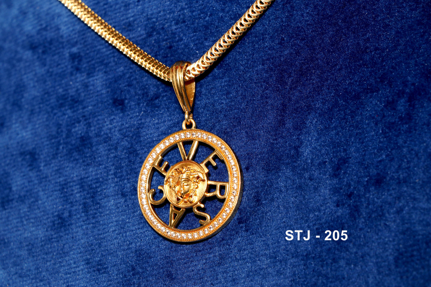 Gold Plated circular men's locket with motif and studded detailing.