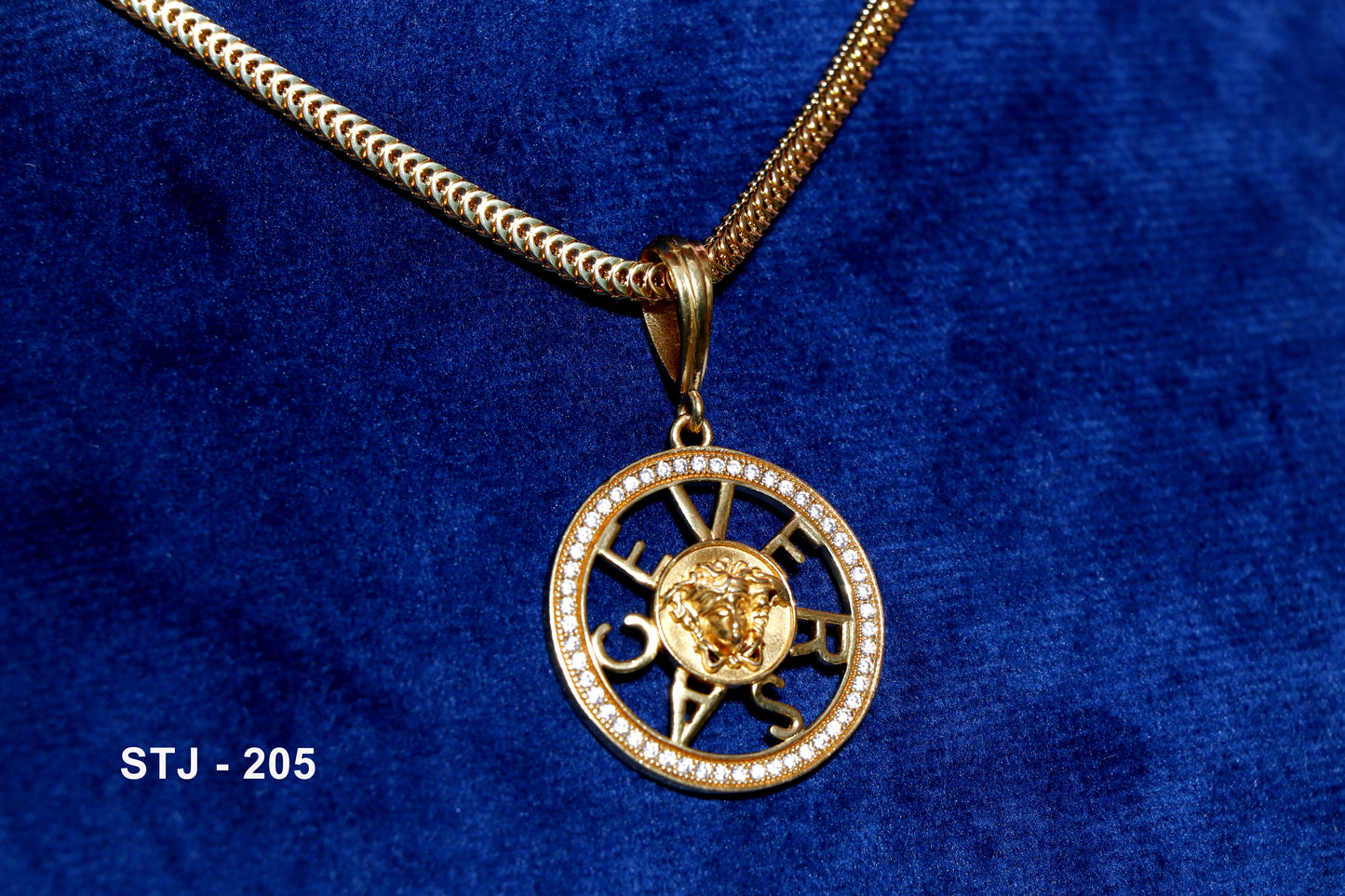 Gold Plated circular men's locket with motif and studded detailing.