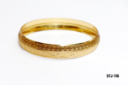 Gold Bangle with Circular and Textured Engravings